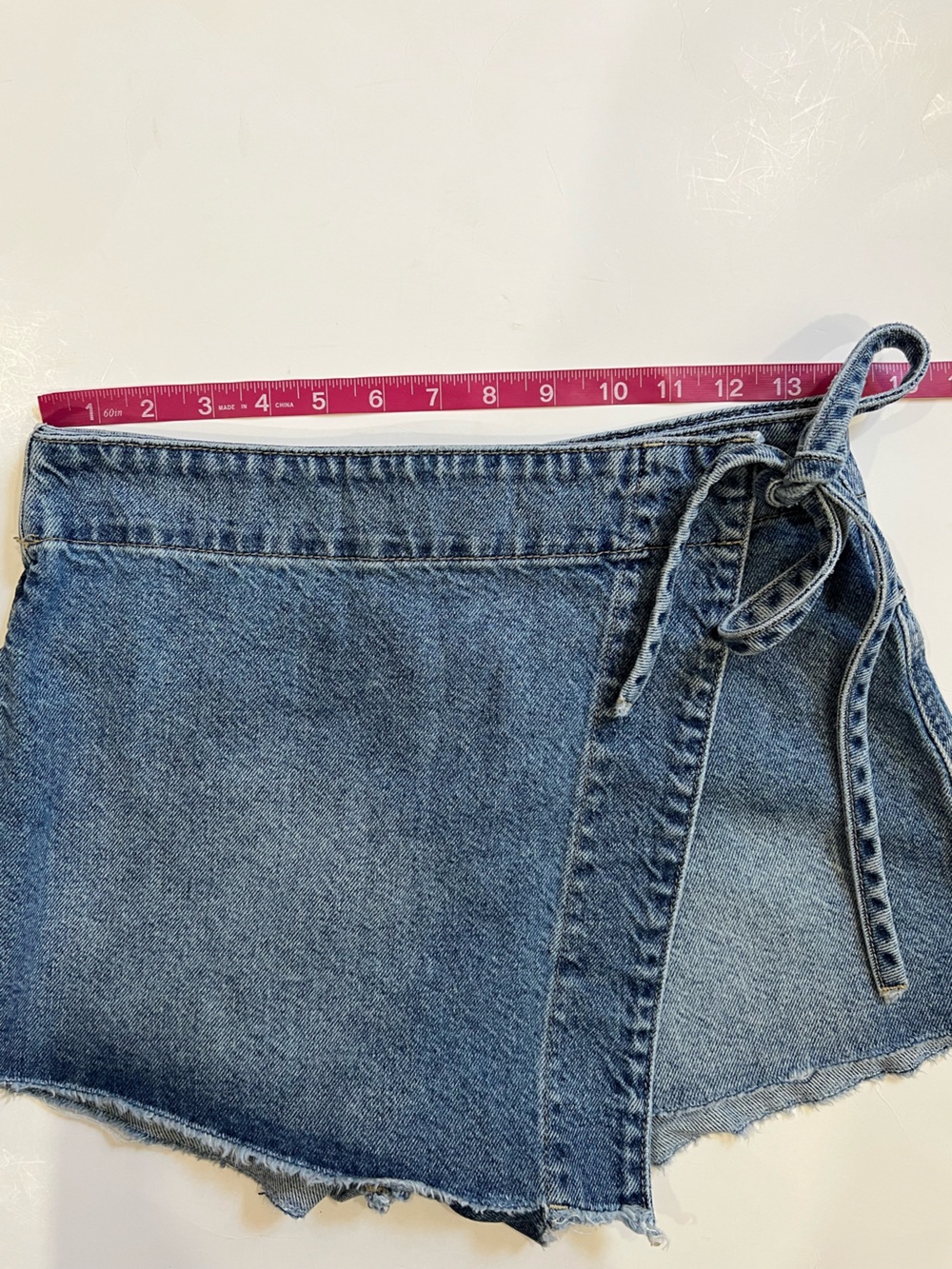 Free People Emmy Denim Faux Wrap Mini Skort with Side Tie - Picture 10 of 12